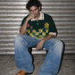 Club Patchwork Textured Knit Cricket Jersey: Green Checkered